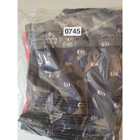 Robert Graham Black Swim Trunks with White Skull Motif - Picture 6 of 6